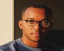 The contestant is seen wearing glasses in some of his posts.